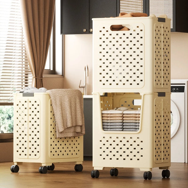 A beige foldable laundry basket with mesh panels and handles is shown on a wooden floor.