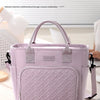 A lavender insulated lunch bag with a quilted pattern is shown on a white surface.
