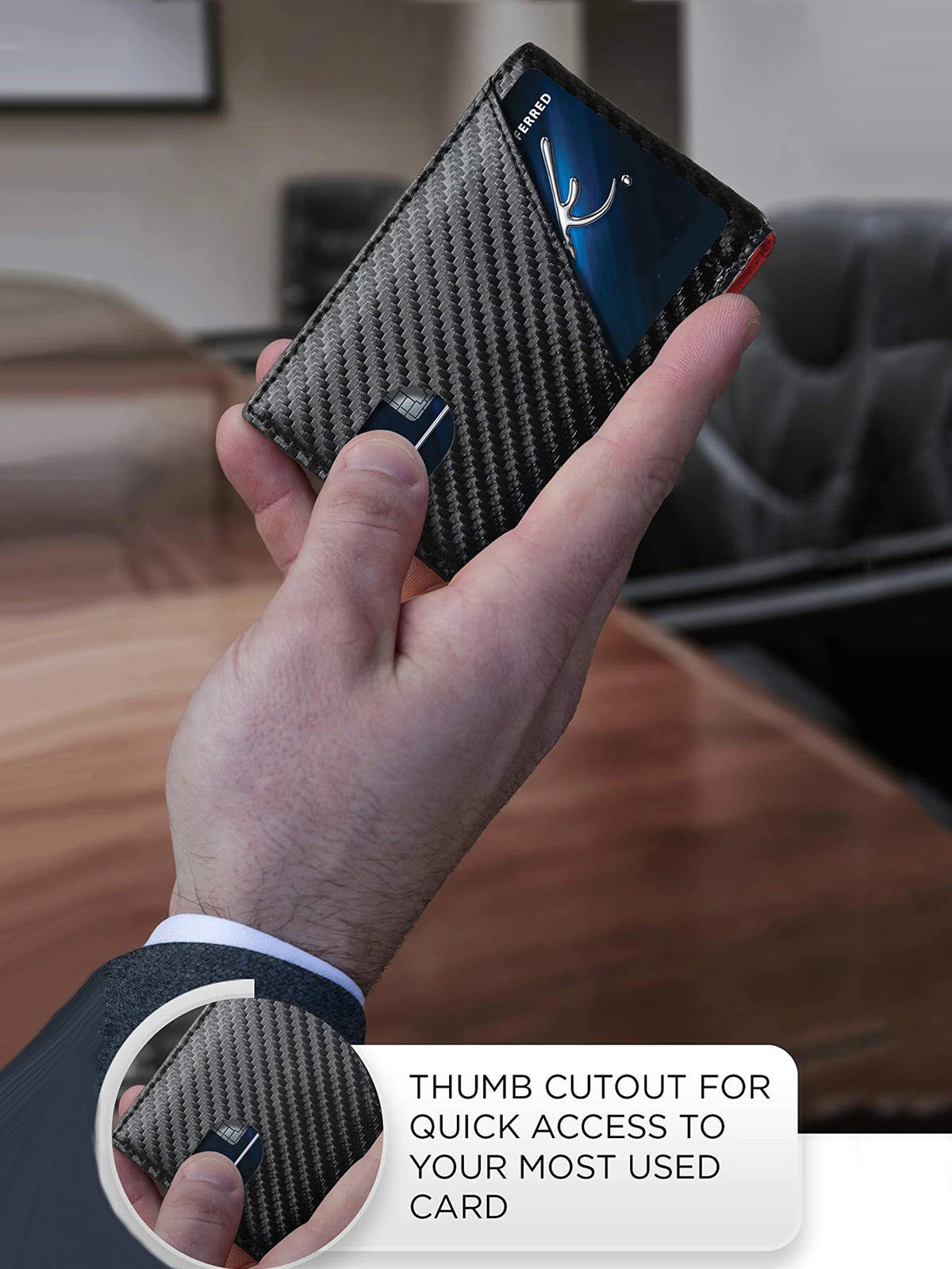 A hand holds a black woven wallet with a thumb cutout for quick access to a card.