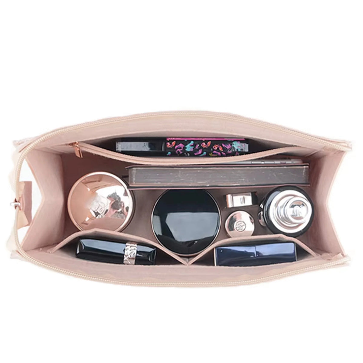 A light pink felt purse organizer showing various small items like jewelry, sunglasses, and cosmetics organized in compartmen