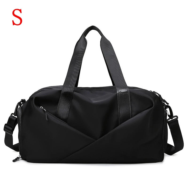 Black nylon gym and travel duffel bag with shoulder straps