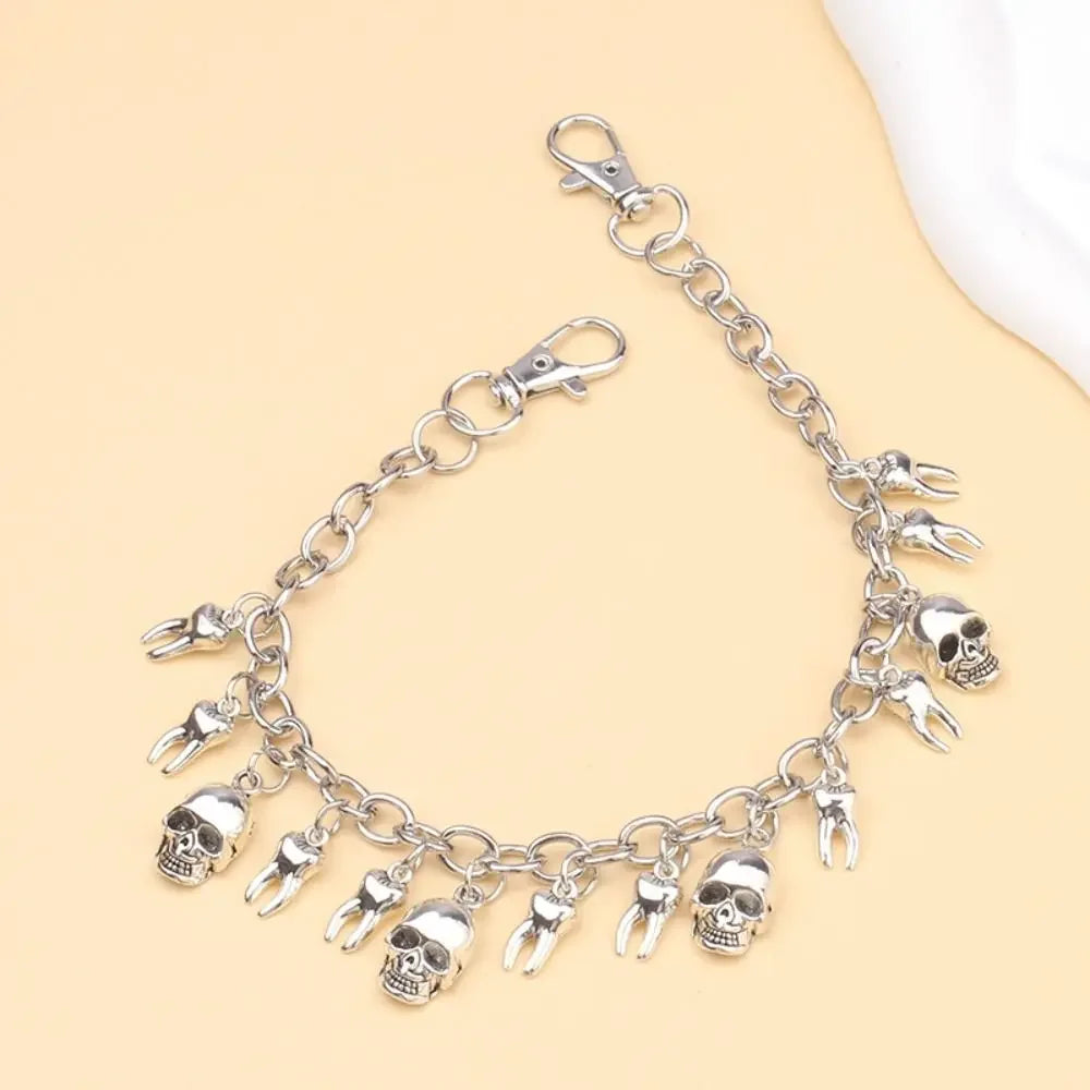 Silver metal purse chain strap with skull charms and lobster clasps
