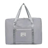 A light gray canvas travel storage bag with a handle and zipper pocket.