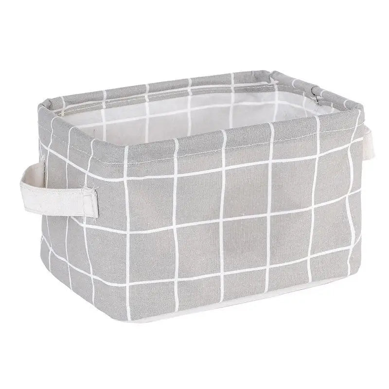 A gray and white checkered storage basket made of waterproof cotton linen for desk organization.