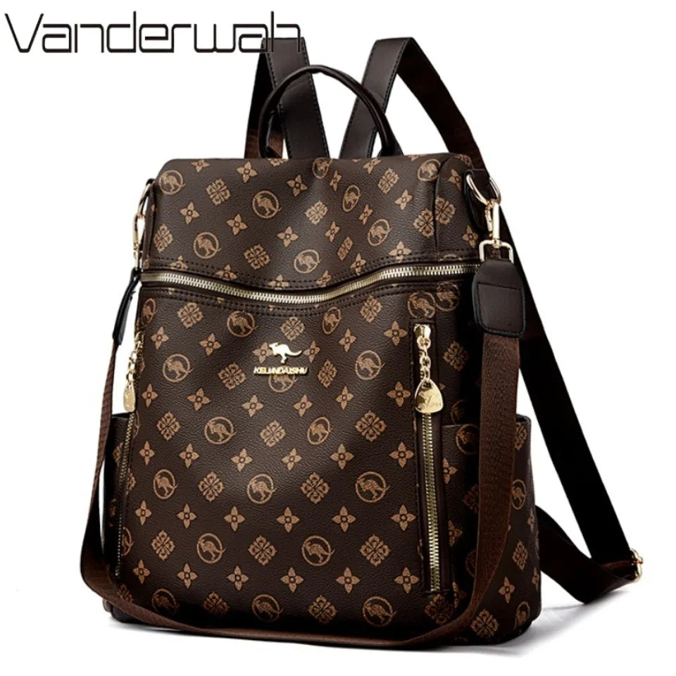 A brown genuine leather women's backpack with gold accents and a dark brown fabric pattern.