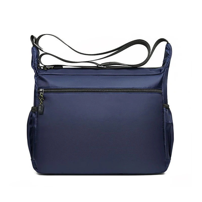 A navy blue men's business crossbody bag with black adjustable straps and a zippered pocket.
