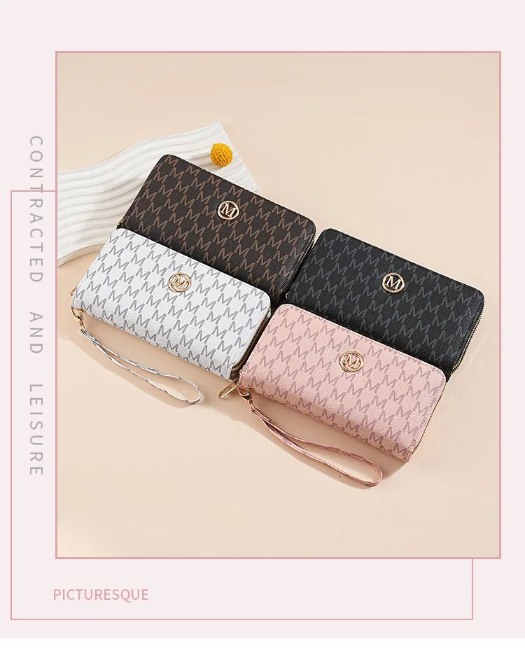 A collection of four patterned wallets in brown, gray, black, and pink leather with gold accents.