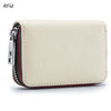 A beige genuine leather accordion card holder wallet with a silver zipper and red stitching.