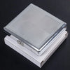 A silver decorative metal cigarette storage box with a clear lid resting on a dark surface.