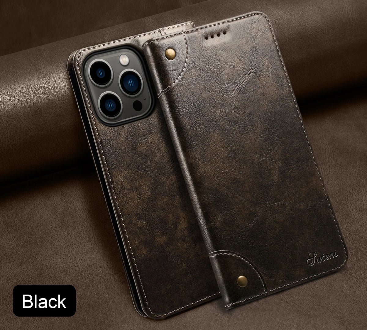 A black magnetic leather flip case with a camera cutout is shown resting on a brown leather surface.