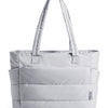 A light gray quilted tote bag with padded straps shown against a white background.