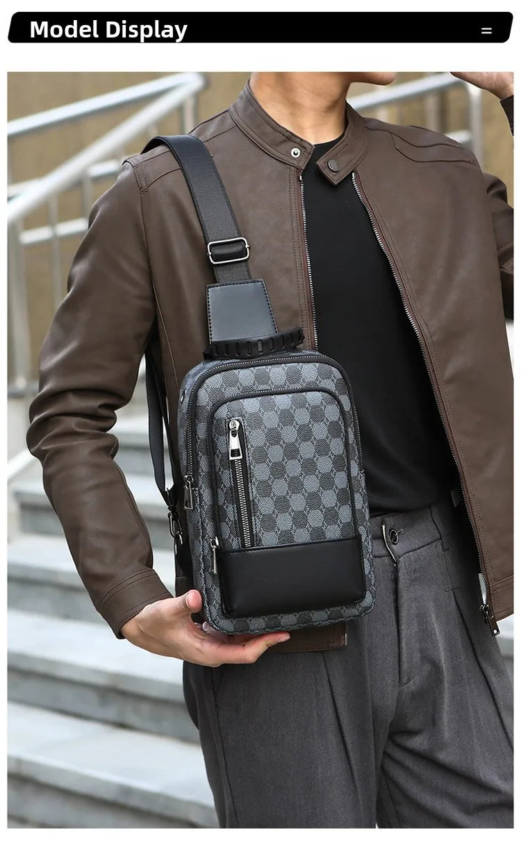 A man wearing a brown leather jacket and dark shirt holds a gray and black geometric pattern crossbody bag.