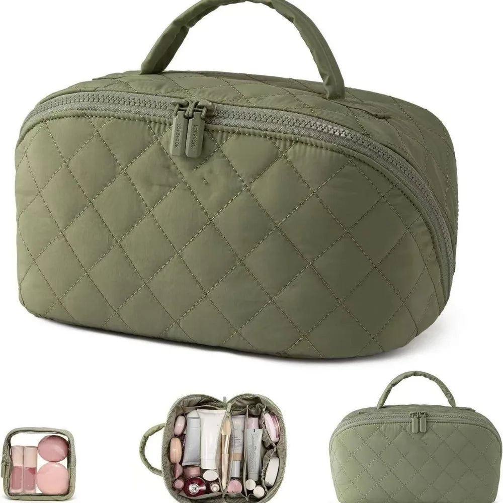 A olive green quilted lay-flat makeup organizer bag with a handle and a separate small pouch.