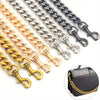 A collection of thick metal purse chain replacement straps in gold, silver, and black finishes.