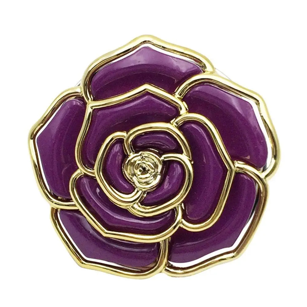 A close-up of a purple rose-shaped metal fold-over bag hook with gold accents.
