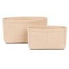 Zwei beige Filzhandsatttainer-Organizer-Inlays nebeneinander