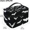 Bolsa portátil para maquillaje con temática de murciélago, vista desde arriba.