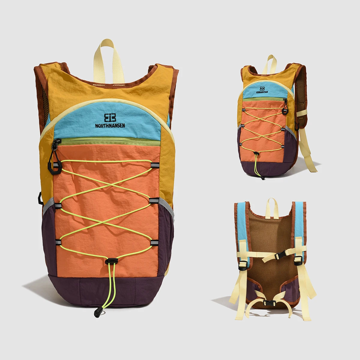 A set of three lightweight travel hiking backpacks in shades of yellow, orange, and purple.