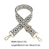 Black and white patterned nylon crossbody bag strap with gold hardware