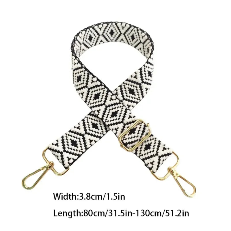 Black and white patterned nylon crossbody bag strap with gold hardware