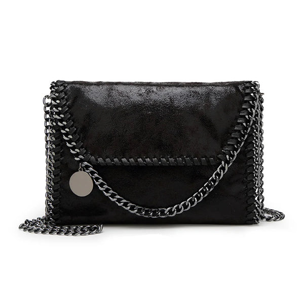 Black vintage flap crossbody bag with a silver chain strap.