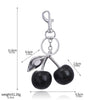 Silver crystal cherry fruit keychain with a hook and a spherical fruit charm