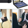 A black elegant PU leather passport holder wallet is shown next to a passport and being held by a person.