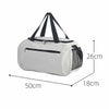 A white waterproof sports duffel bag with black straps and a mesh pocket shown from the side.