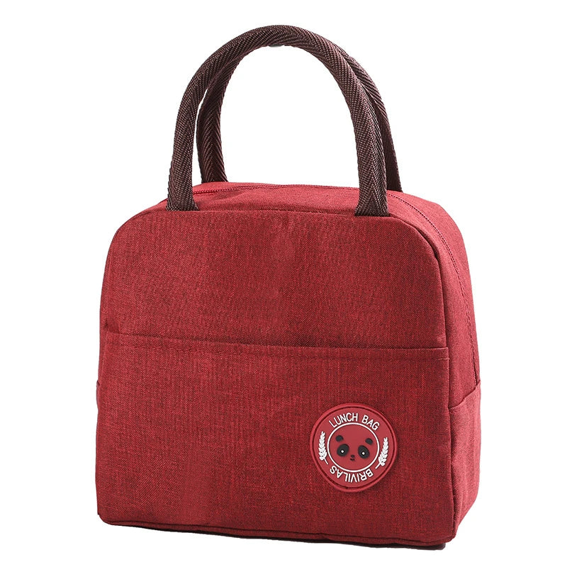 A maroon insulated lunch bag with a brown strap is shown against a white background.