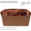 A brown luxury bag organizer insert with a satin lining showing multiple color options for matching.