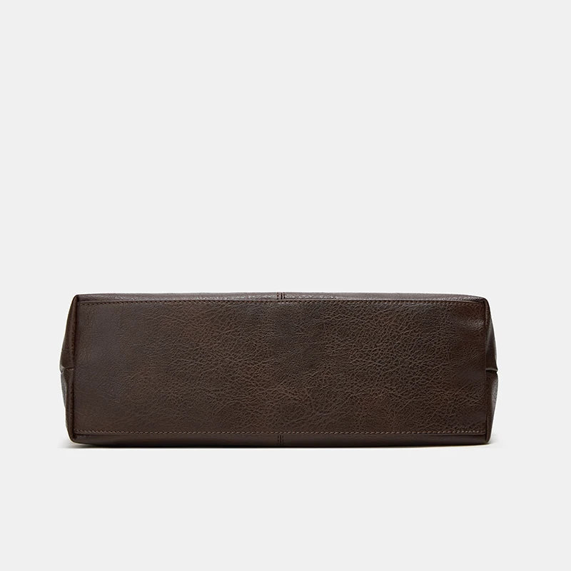 A dark brown soft PU leather retro tote bag with a zipper closure.