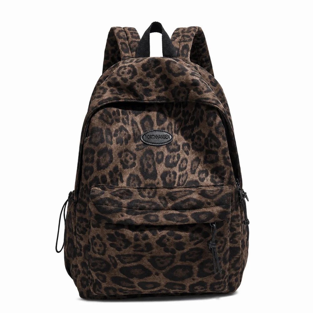 A brown leopard print laptop backpack with black padded straps.