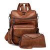 A brown retro PU leather travel backpack featuring zippered compartments and tassel details.