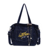 A dark blue denim crossbody bag with a flap and chain detail is shown against a white background.