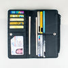 A black bi-fold wallet displaying various cards and an ID window.