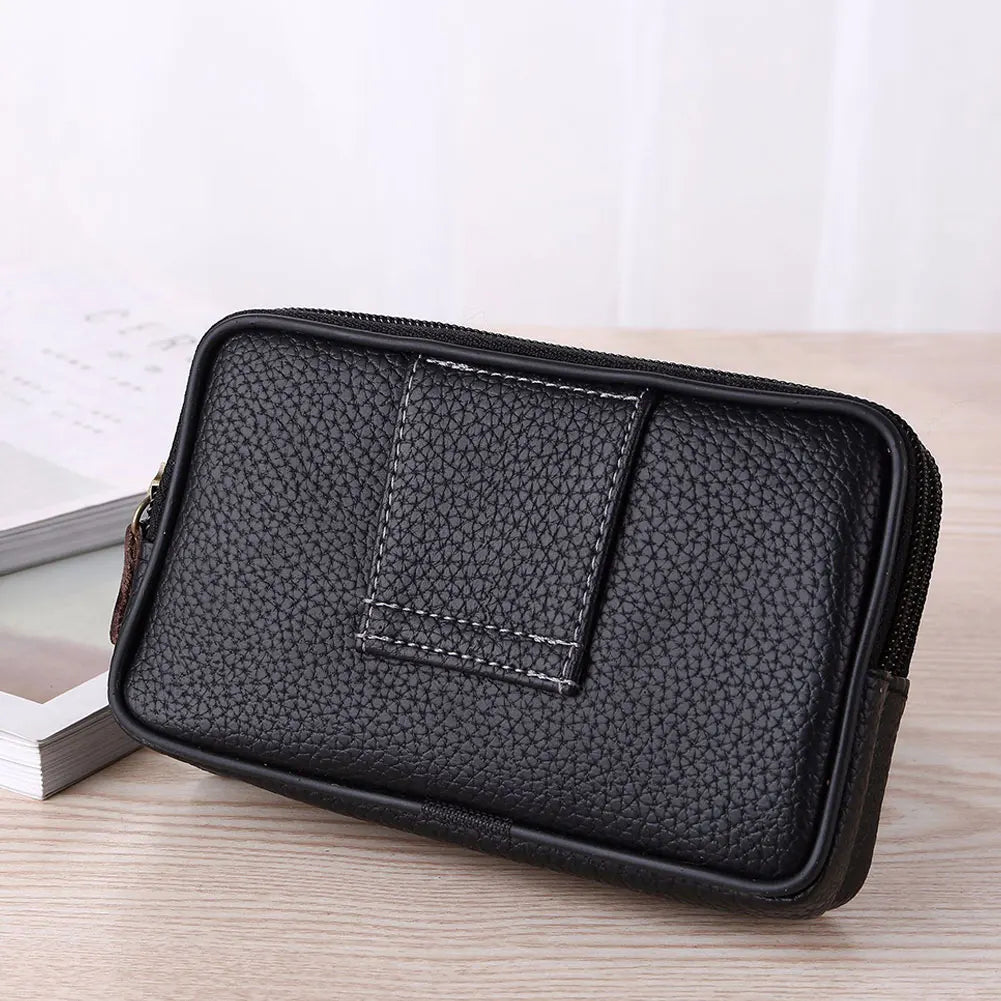 A black multi-function PU leather waist bag with a stitched pocket is shown on a wooden surface.