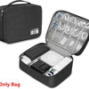 A black leather cable storage organizer bag with an open compartment showing various cables and accessories.