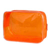 An orange transparent PVC travel makeup bag with a zipper closure.