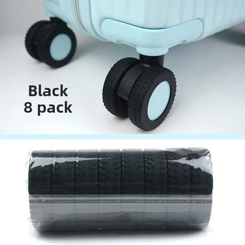 Black travel luggage wheel protectors set of 8, shown in a black plastic packaging.