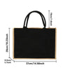 Schwarze Vintage-Jute-Burlap-Tasche mit schwarzen Henkeln und natürlichen Tan-Kanten.