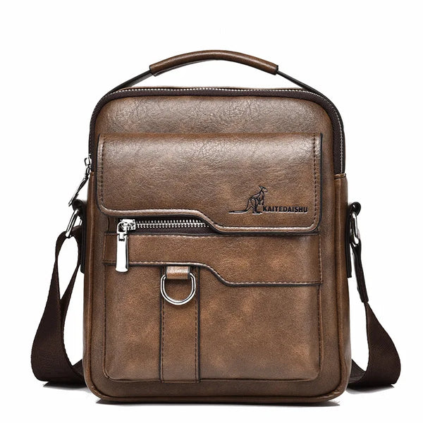 Sac bandoulière vintage en cuir marron avec fermeture éclair et garniture en cuir.