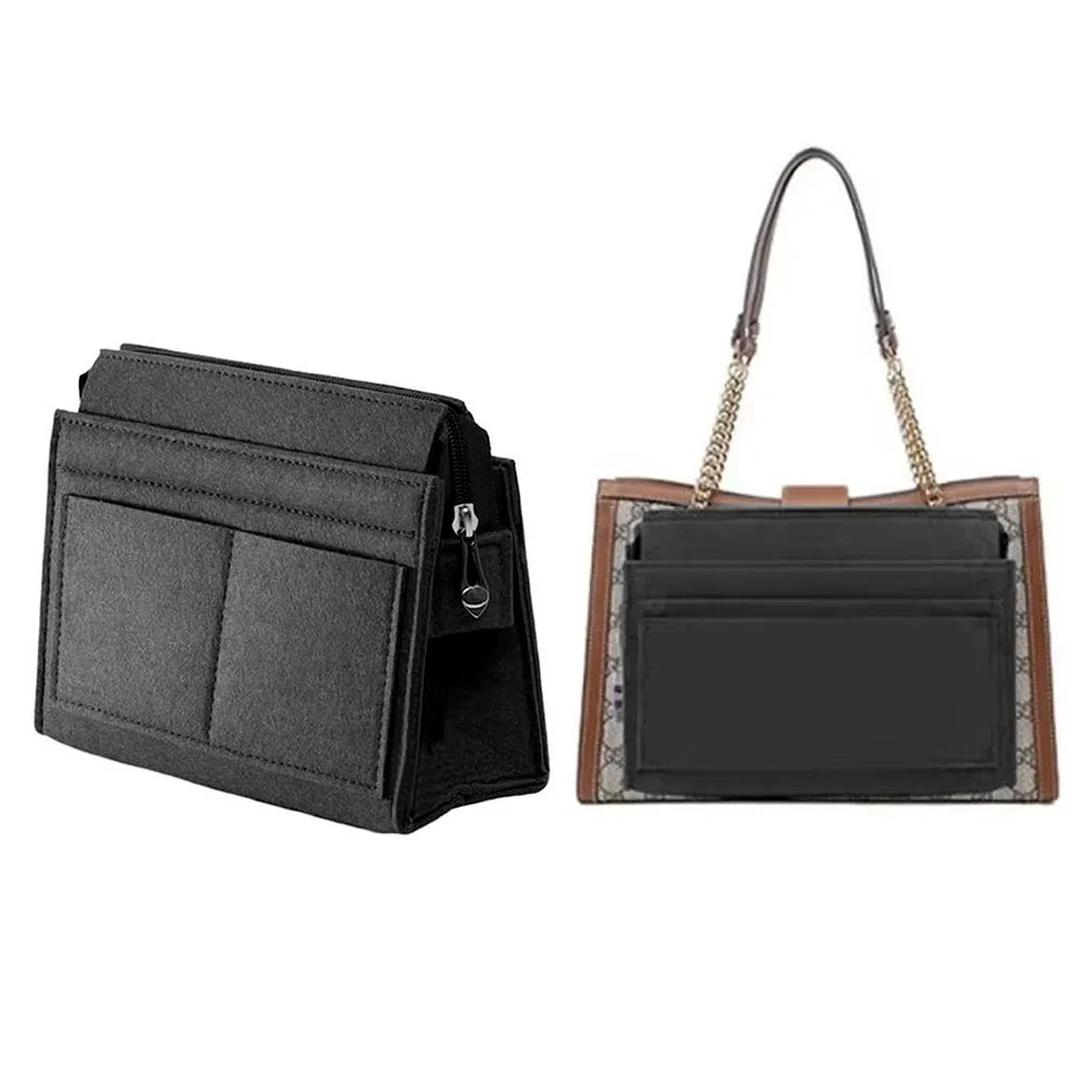 A black felt purse organizer with multiple pockets and a gold-toned strap is shown.