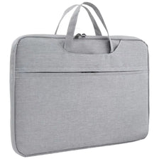 A gray premium laptop sleeve designed for Apple and PC devices.