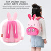 Pink cartoon animal plush backpack with soft shoulder straps being worn by a child.
