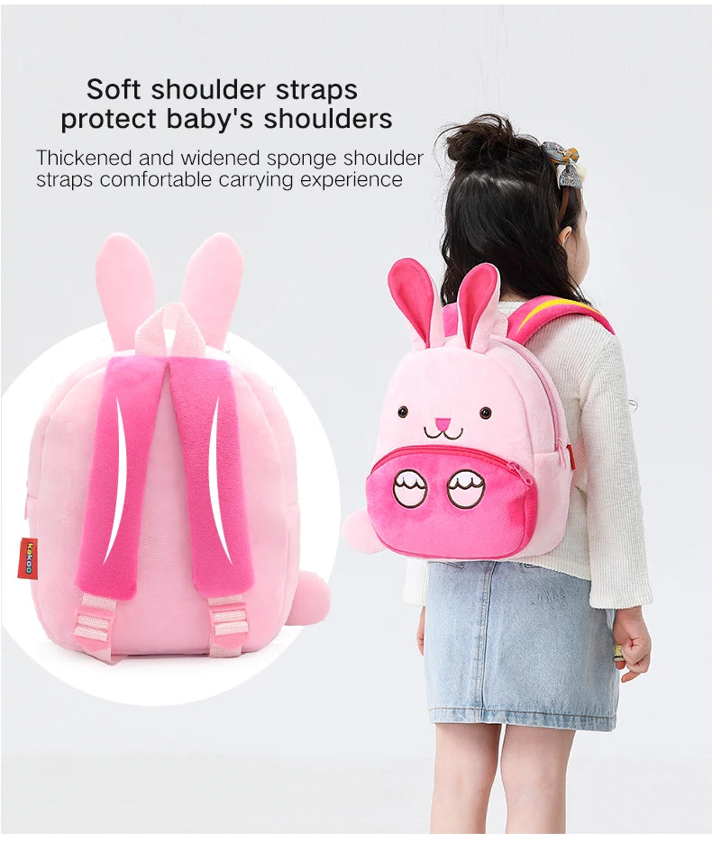 Pink cartoon animal plush backpack with soft shoulder straps being worn by a child.