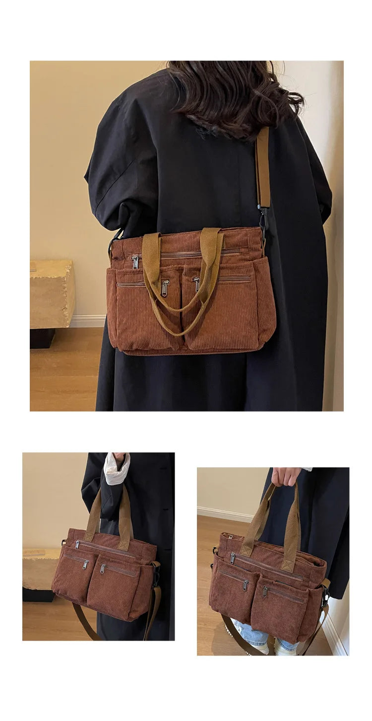 A dark brown corduroy tote bag with adjustable leather straps is shown against a black garment.