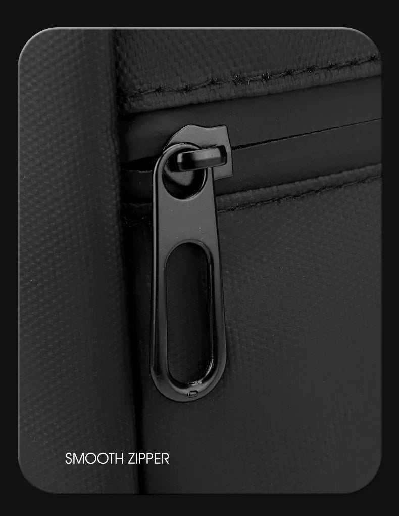 Close-up of a black smooth zipper on a travel backpack.