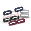 A set of silicone watch strap retainer rings in various shades of blue, pink, and gray.