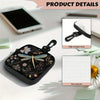A black coin purse with a floral pattern and a hook closure is shown on a white surface.