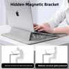 A hand places a laptop onto a hidden magnetic bracket for support, demonstrating relief from cervical spine pain.